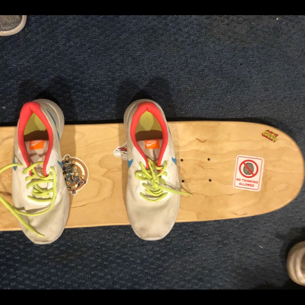 Yellow blue orange pink Nikes